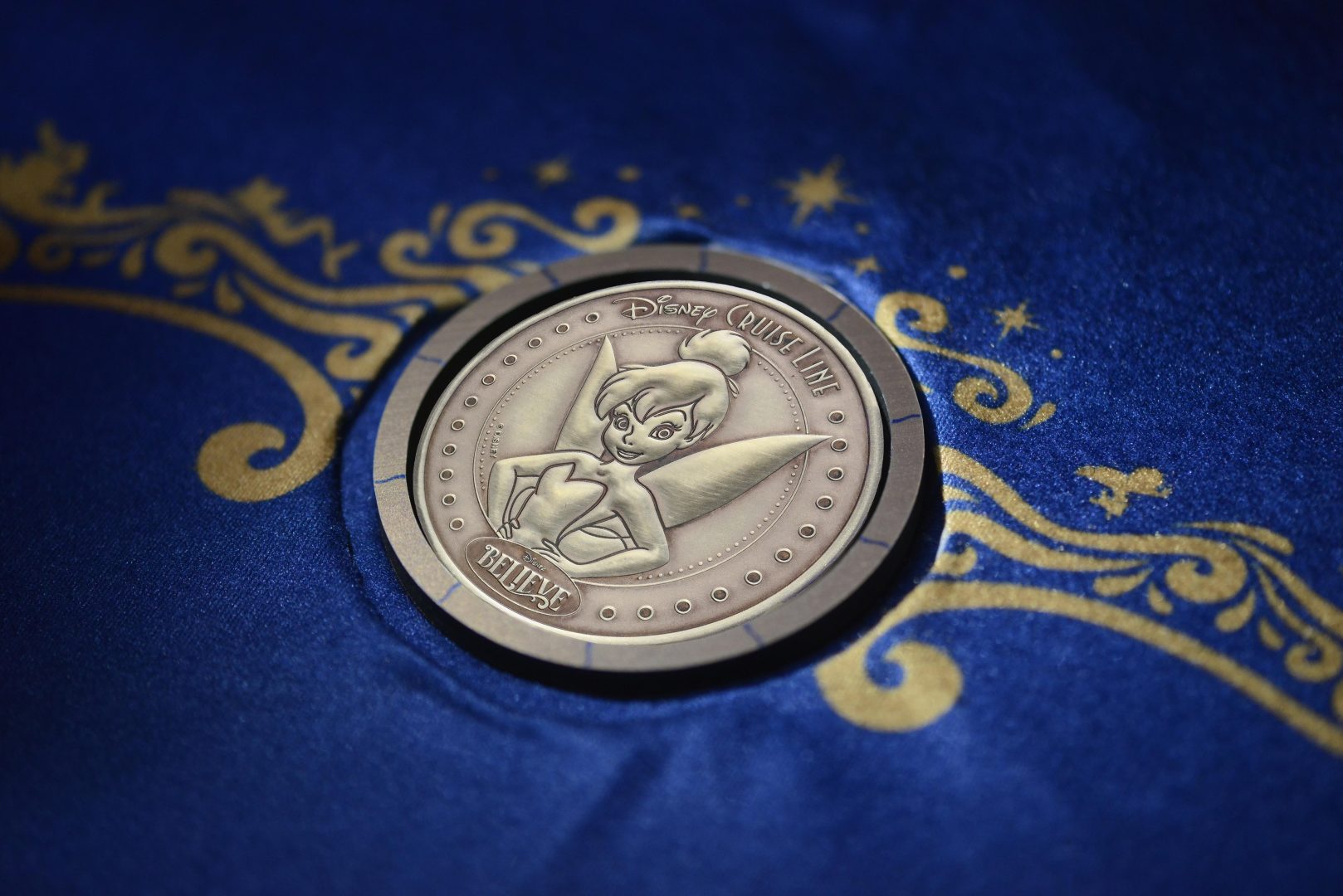 The Disney Believe keel coin with Tinker Bell