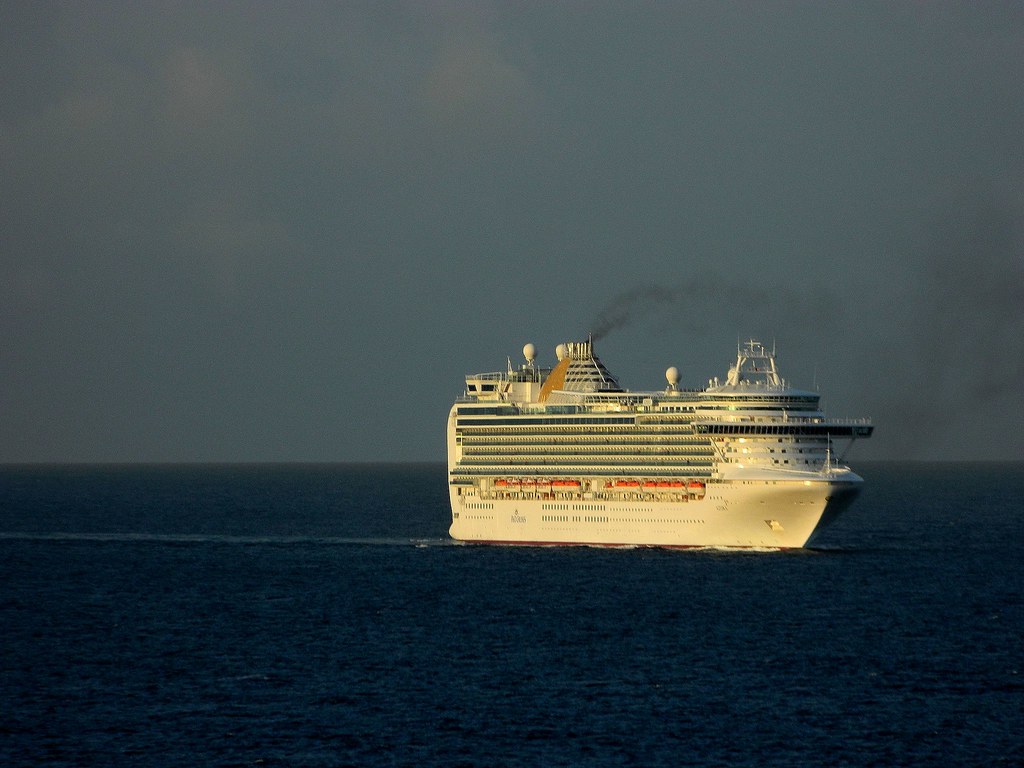 A Disney Cruise Line ship sailing in the Caribbean