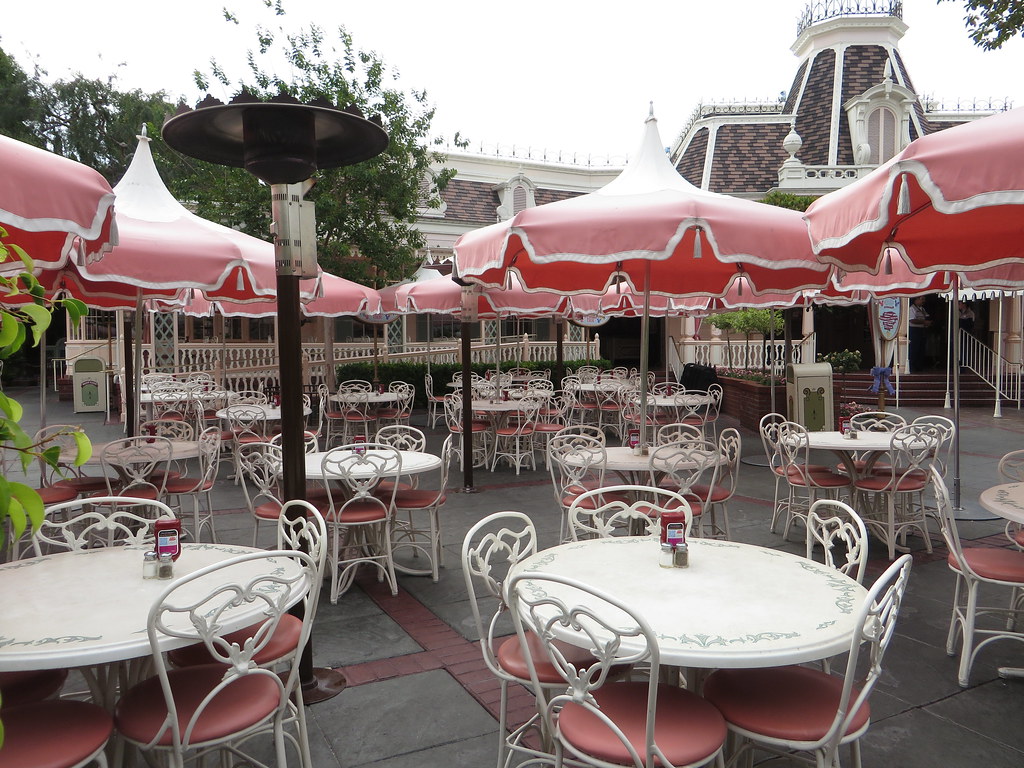 The Plaza Inn patio with Sleeping Beauty Castle beyond.